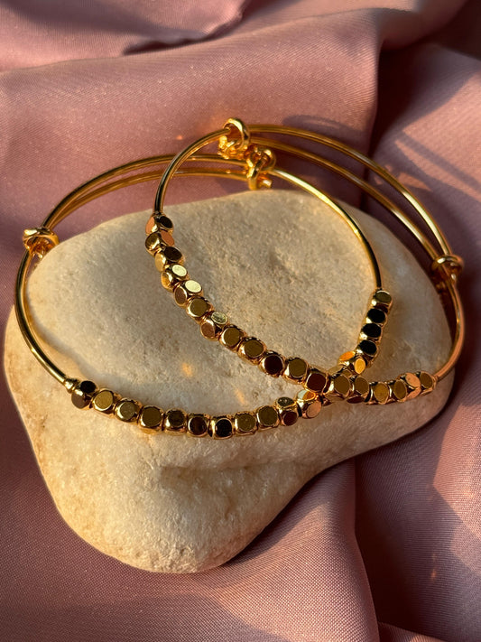 PAIR OF 2 ADJUSTABLE GOLD BANGLES